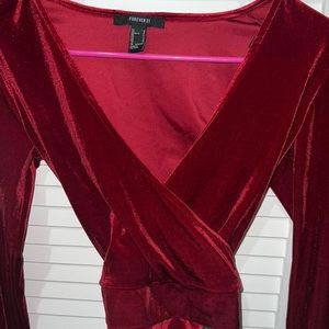 Forever 21 red velvet wrap top. Never worn.